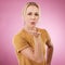 Portrait, woman and blowing kiss on pink background for love, care and flirting lips on color backdrop in studio. Female