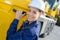 Portrait woman at cab heavy plant vehicle