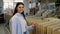 Portrait of woman with ceramic tiles in a hardware store