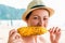 Portrait of a woman with a delicious corn grill