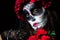 Portrait of woman dressed as catrina, skull to honor the dead in Mexico