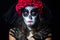 Portrait of woman dressed as catrina, skull to honor the dead in Mexico