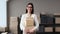 Portrait Of A Woman Entrepreneur Holding Parcels Boxes