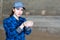 Portrait of woman farmer with handful of fodder