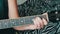 Portrait of woman with guitar,Closeup Of Young Woman`s Hand