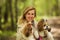 Portrait of a woman with her beautiful dogs