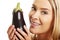 Portrait of a woman holding eggplant