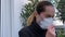 Portrait woman ill infection flu coronavirus cough in mask close up. Symptom 4K.