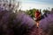 Portrait of a woman in a lavender field, aromatherapy and a walk in a fragrant field, a feeling of freshness and joy from the walk