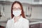 Portrait of a woman in a medical mask, personal protective equipment against viruses and diseases