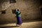 Portrait of a woman with a prayer wheel from Lhasa Tibet