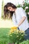 Portrait Of Woman Pruning Flower