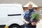 Portrait Of Woman Running Mobile Gardening Business Outside House