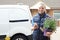 Portrait Of Woman Running Mobile Gardening Business Using Mobile