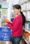 Portrait Of Woman Shopping Cosmetics In Pharmacy