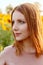 Portrait of woman in sunflowers