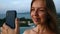 Portrait of Woman Tourist Making Video on Mobile Phone for Social Network