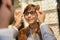 Portrait of woman trying eyeglasses on