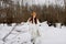 portrait of a woman Walk in winter field landscape outdoor entertainment winter holidays