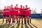 Portrait Of Womens Football Team Training For Soccer Match On Outdoor Astro Turf Pitch