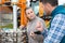 Portrait workers heavy equipment during inspection