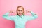 Portrait of yelling person with her eyes closed wearing turquoise formalwear isolated over pink background