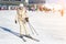 Portrait of young adult beautiful happy caucasian woman smiling near lift station at alpine winter skiing resort. Girl