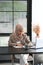 Portrait of young Arabic business woman wearing hijab in front of laptop search and doing office work.