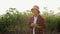 Portrait of Young Asian Farmer smiling in cassava fields