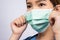 Portrait of young asian nurse wearing surgical mask