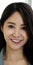 Portrait of young attractive asian creative woman or designer smiling and looking at camera in modern office feeling confident