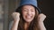 Portrait young attractive funny cute caucasian woman in hat looking at camera contented excited surprised emotional girl