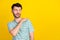 Portrait of young attractive guy funny showing how cool he look empty space selfish isolated on bright yellow color