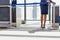 Portrait of young beautiful airport staff opening the gate for boarding in airport