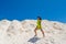 Portrait of young beautiful asian standing at sand mountain and looking side