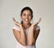 Portrait of young beautiful and happy Latin woman with big toothy smile excited and cheerful