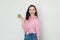 Portrait young beautiful sexy woman holding green apple, copy space