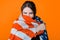 Portrait of young beautiful woman with american flag, bright red background.