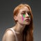 Portrait of young beautiful woman with neon, fluid tears from eyes. Concept of fashion and beauty, emotions and feelings