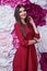 Portrait of young beautiful woman wear red dress brunette