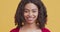 Portrait of young black woman with happy smile on face