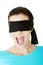 Portrait of a young blindfold woman screaming