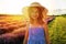 Portrait of young blonde girl in the colour dress in the field of lavander