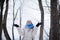 Portrait of a young blonde woman outdoors in winter