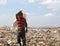 Portrait of a young boy working in a Nicaragua dump to survive.