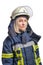 Portrait young brave girl firefighter in a fireproof uniform and helmet in her head looks at the camera.