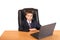 Portrait young businessman using laptop
