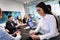 Portrait of young businesswoman in conference room