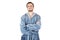Portrait of young caucasian bearded proud man in blue bathrobe with crossed hands isolated on white background