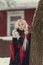 Portrait of a young caucasian woman in russian style on a strong frost in a winter snowy day. Russian model girl